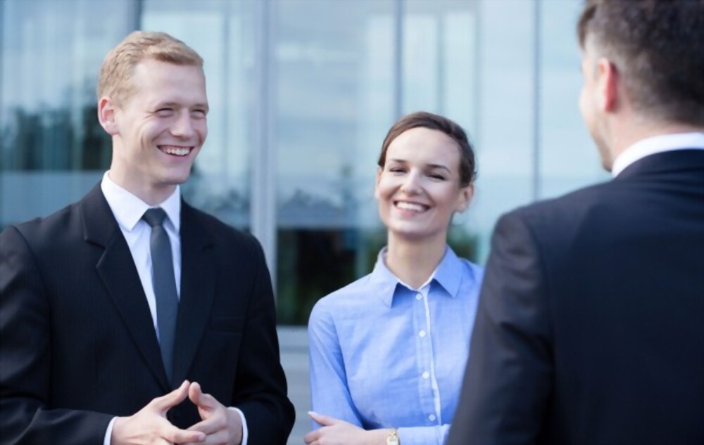 Employees engaging in small talk