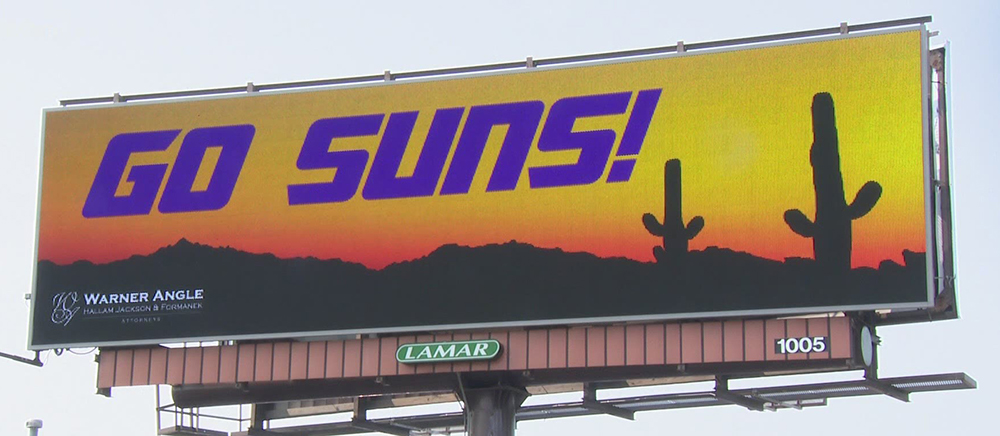 Warner Angle law firm put up Go Suns digital signage to troll bucks fans.