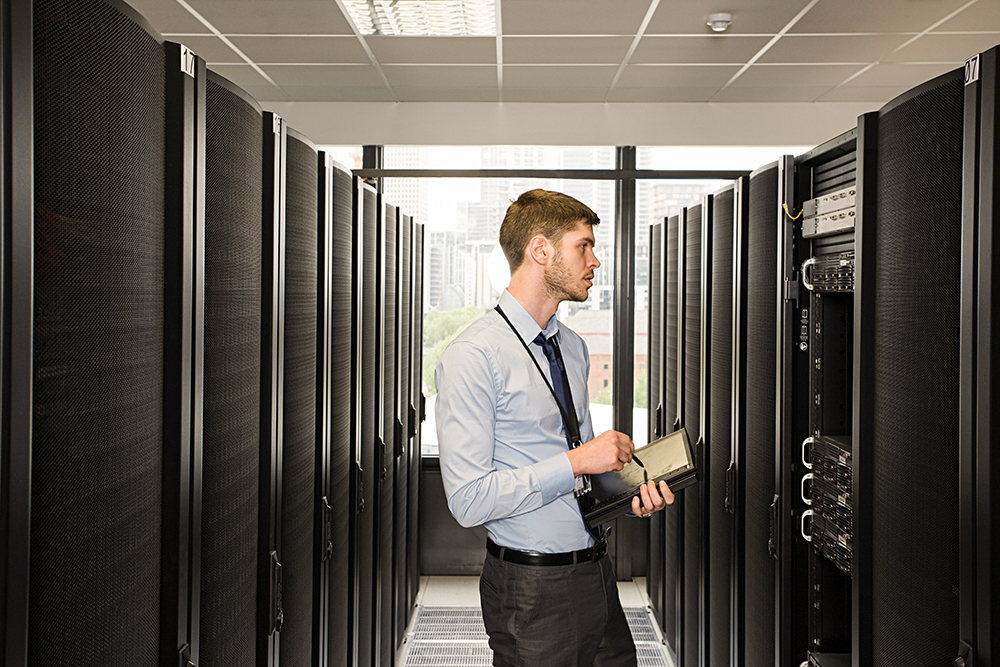 Computer technician working on a server