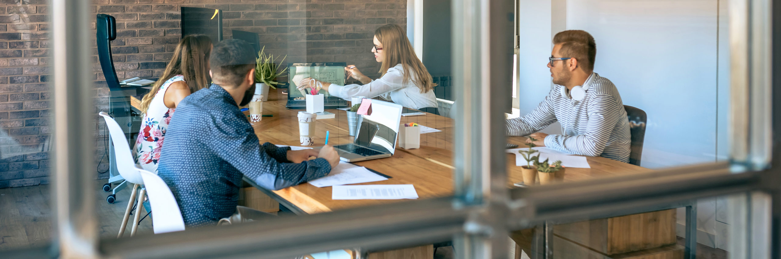 Young people at a business meeting in the office