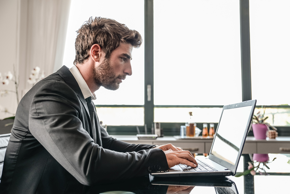 Lawyer working on computer desk on laptop