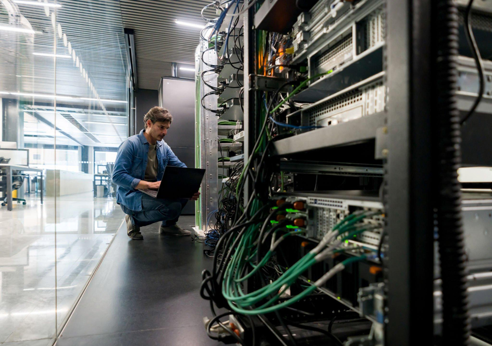 IT engineer running a security scan on a network in a data center