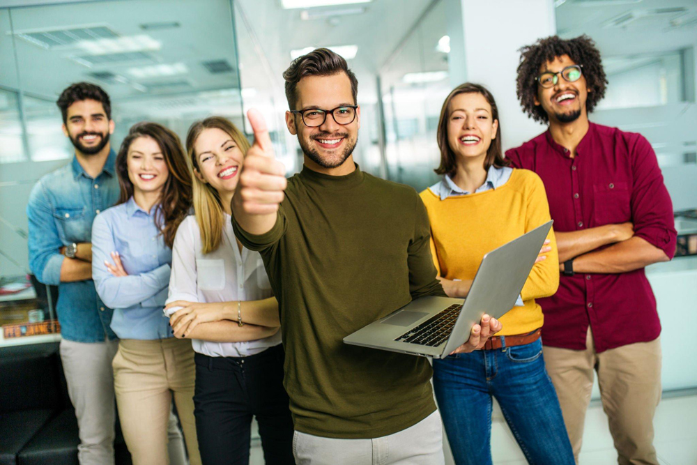 Group of team with thumbs up after a cybersecurity training session