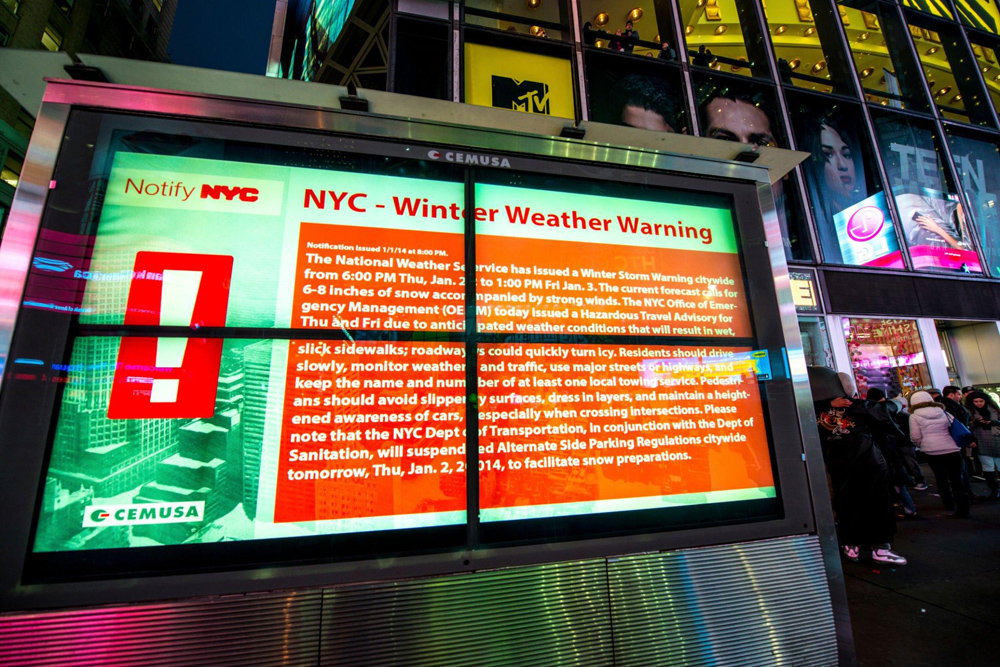 Video wall of digital signage warning people of bad weather