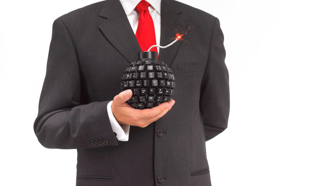What is push bombing man holding a bomb made out of a keyboard.